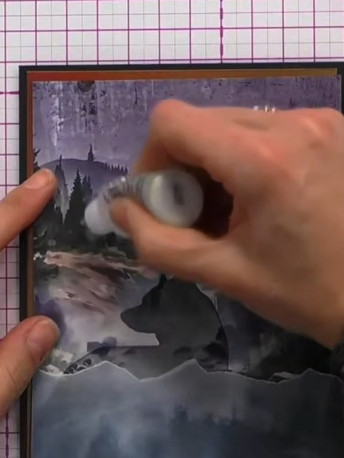 Step 6: Add sparkles to the trees on the vellum using a glitter glue or stickles applicator. Apply small amounts to cr