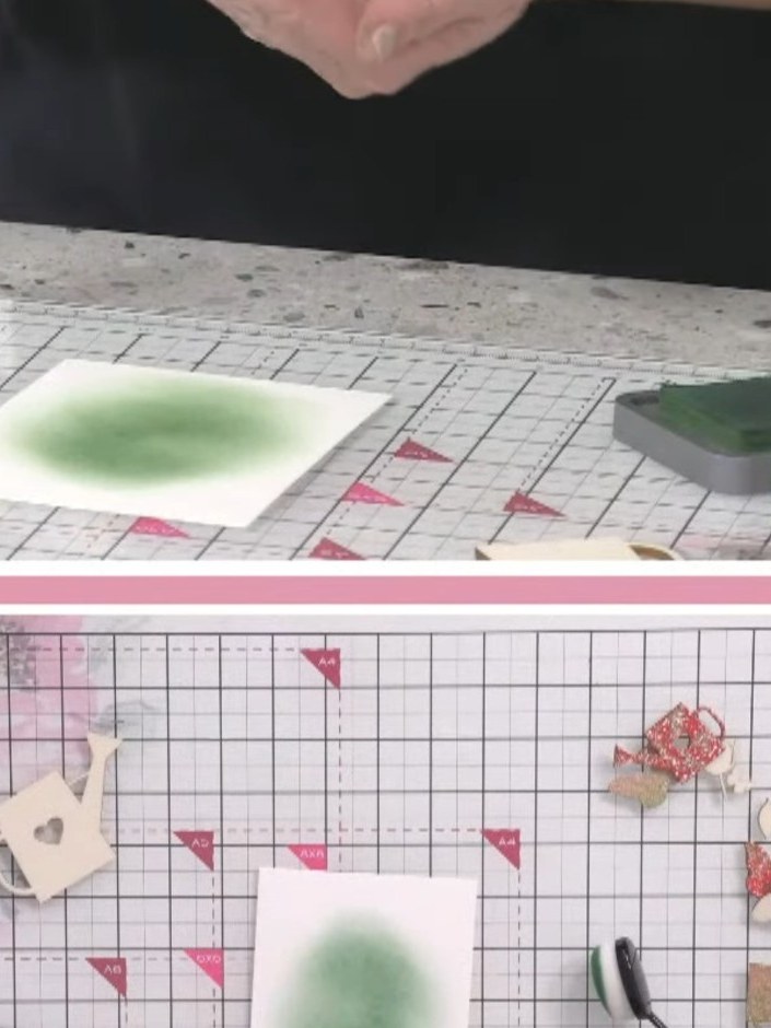 Step 3: Colour the stamped umbrella using ink pads. Apply the green ink to the umbrella shape, blending the colour eve