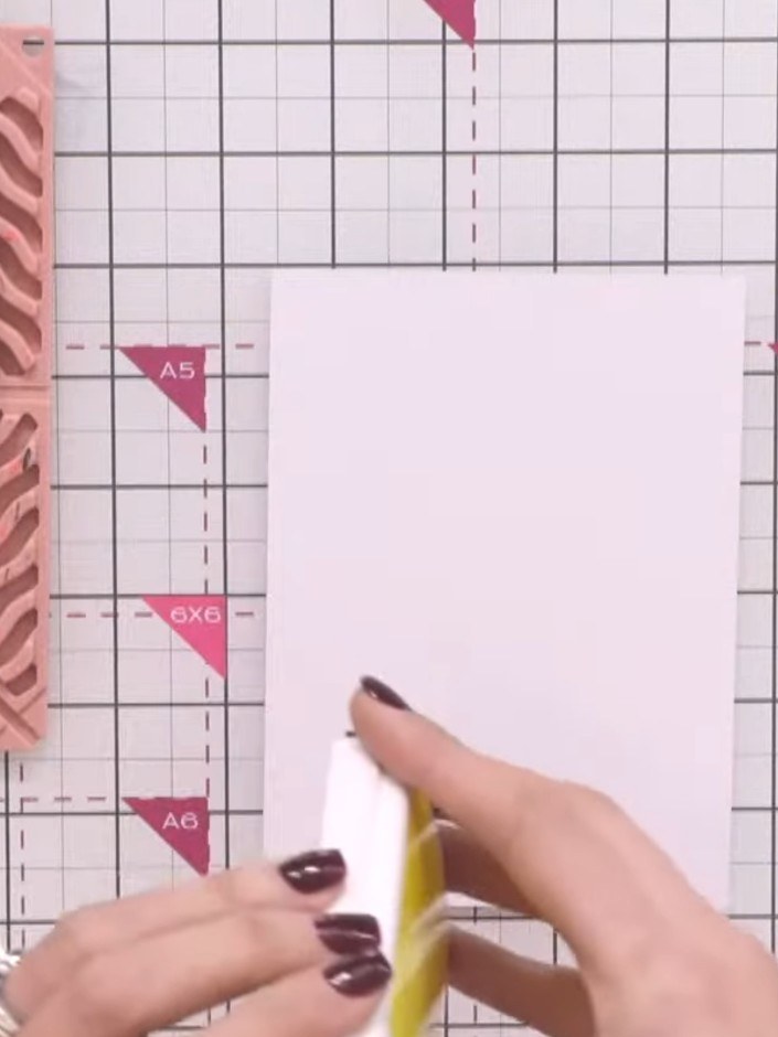 Step 1: Take a piece of white card stock and apply vibrant ink colours directly onto it using a blending brush. Use ye