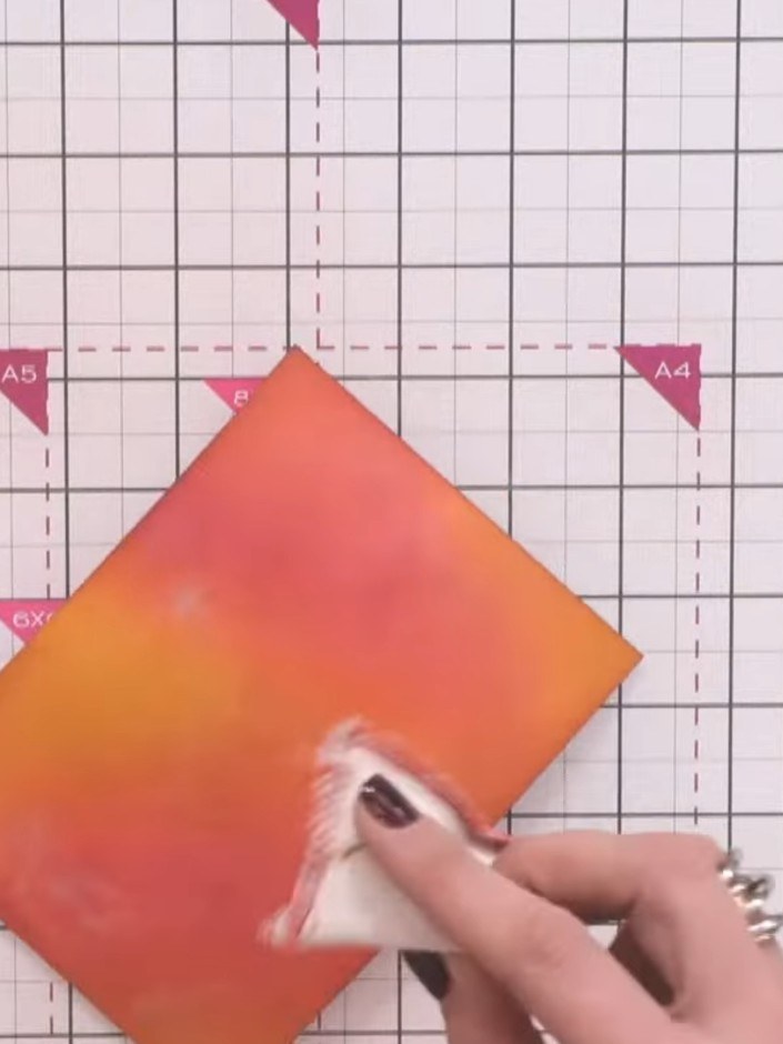 Step 3: Stamp the detailed outline design from the Pretty Things Inside stamp set onto the orange and pink gradient ca