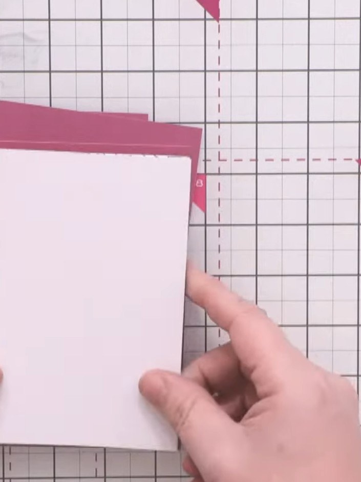 Step 1: Cut four pieces of coloured card measuring 6 by 4 inches (15 x 10 cm). Cut four pieces of white card measuring