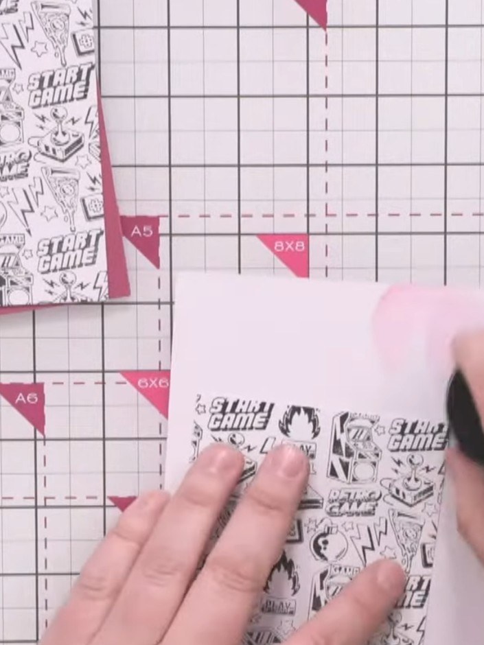 Step 9: Distress the edges of the outer panels using Magenta ink and a piece of scrap card to soften the appearance an
