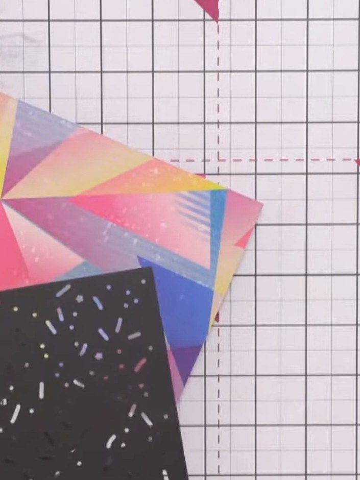 Step 4: Place the colourful geometric patterned paper behind the black die-cut sprinkle panel. Apply glue to the back 