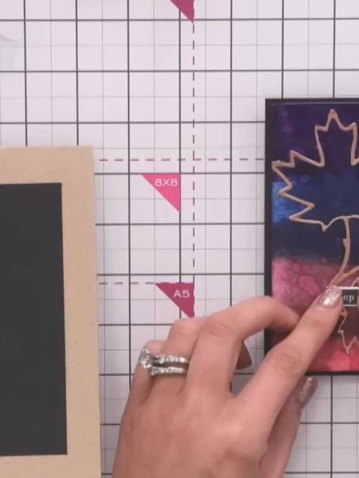 Step 6: Apply the washi tape sentiment across the lower portion of the card, positioning it horizontally below the lea