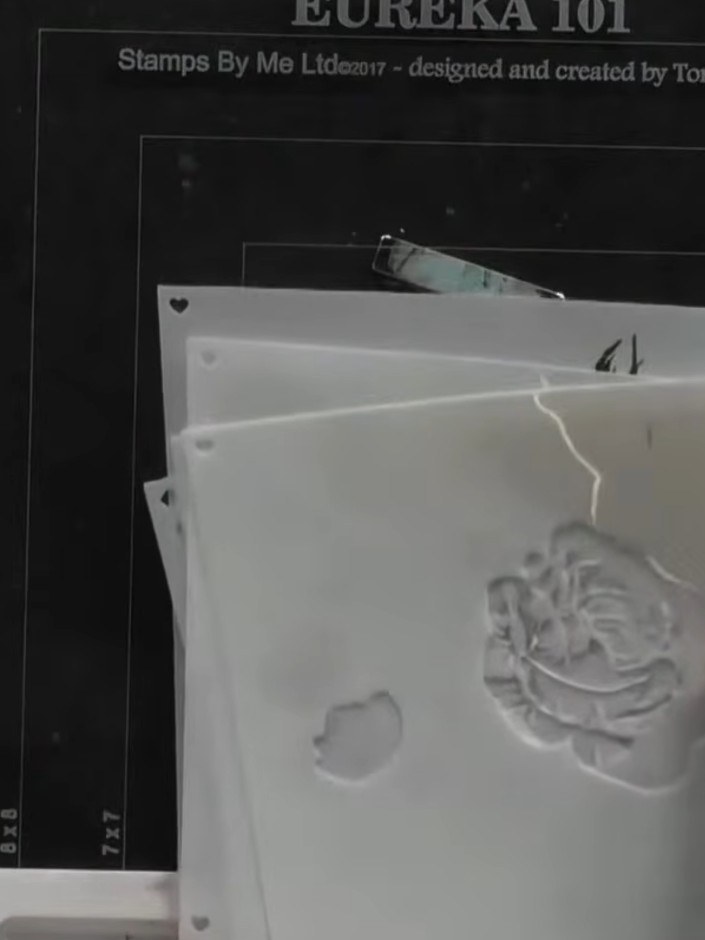 Step 1: Secure your first layering stencil (marked with number 1) to your white card using the magnets on your stampin