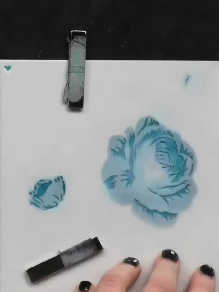 Step 6: Apply the fourth stencil layer using a darker green ink, varying the pressure and coverage to create natural-l