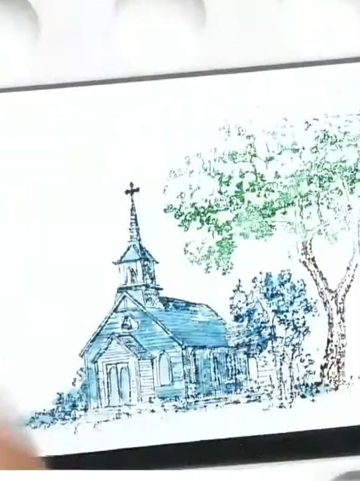 Step 5: Add green watercolour to the foliage areas around the church to suggest trees. Use a dabbing or stippling moti