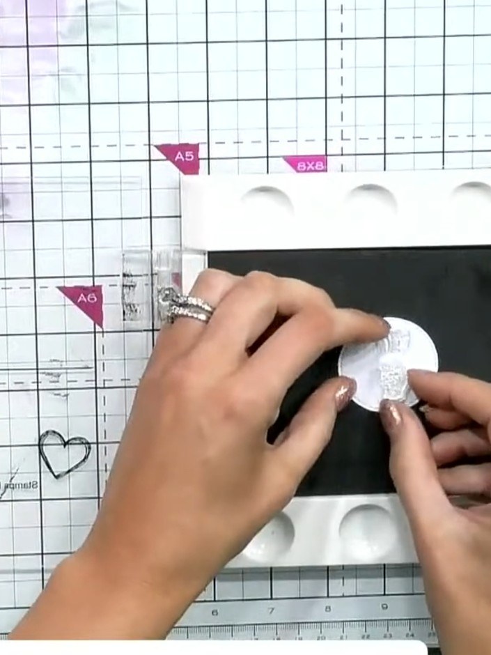 Step 6: Position the shaped card on your work surface and adjust it so it stands upright properly. Ensure the fold all