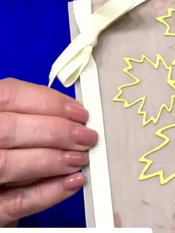 Step 4: Mount the finished maple leaf panel onto a white card base. The yellow outlined leaf design with 'Enjoy your d