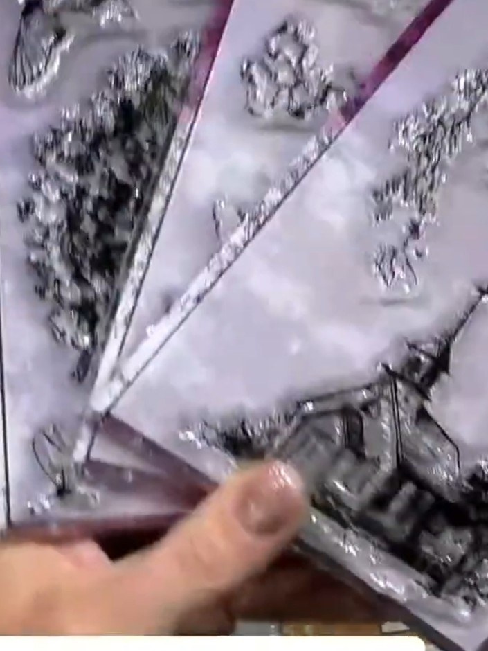 Step 4: Apply embossing powder to the die-cut leaves and heat with an embossing tool to create a raised, glossy finish