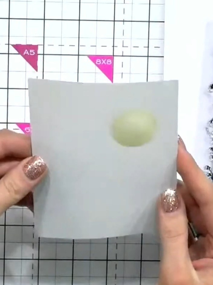 Step 1: Paint a circle of masking fluid onto your card to create a moon shape. Allow it to dry for a couple of minutes