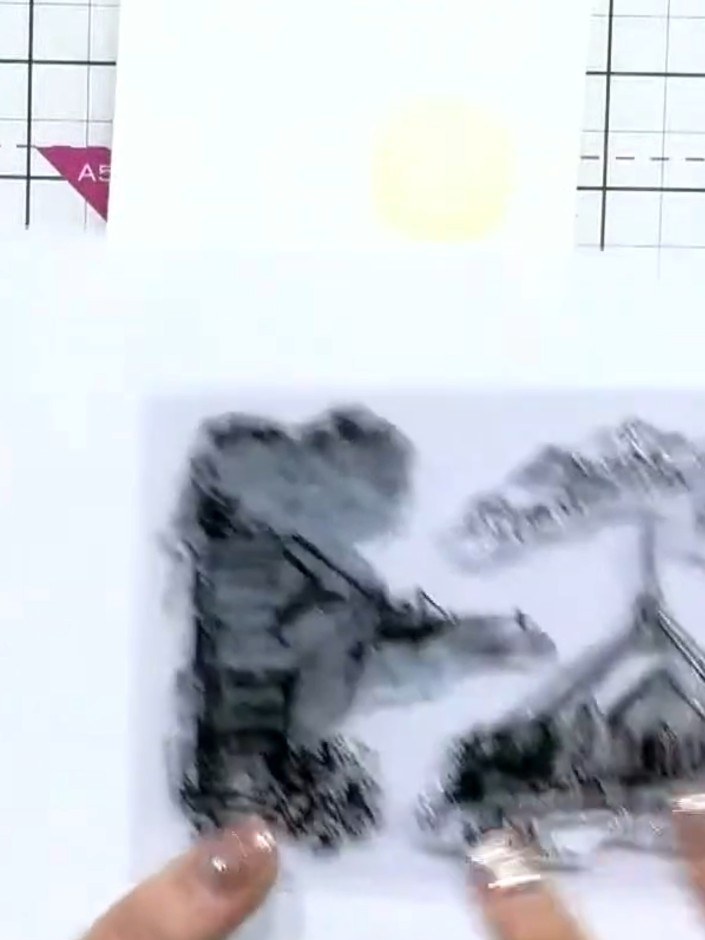Step 8: Once the watercolour is completely dry, gently rub the masking fluid with your finger to roll it off and revea