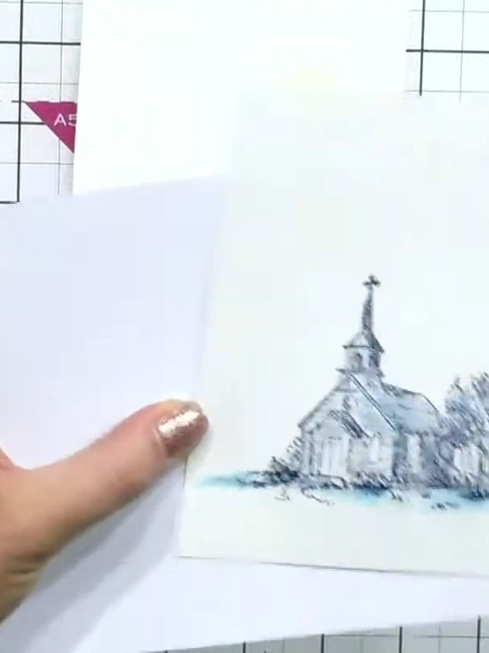 Step 1: Stamp a silhouette design (such as a church or tree) in black ink onto white watercolour card. Position the st