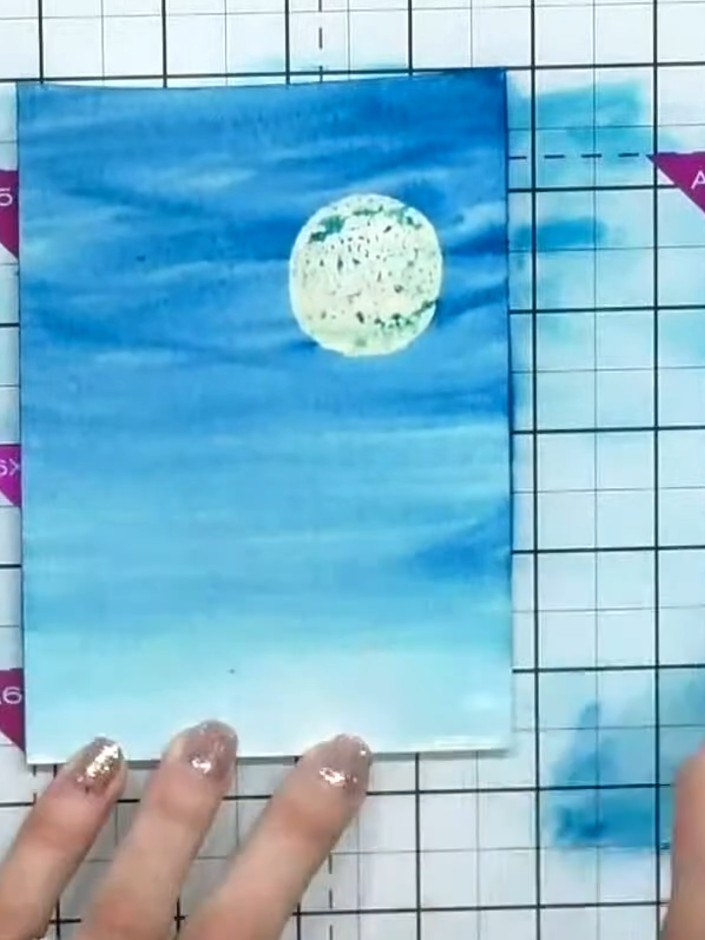Step 5: Allow the watercolour wash to dry completely. Once dry, mount the finished panel onto a card base to complete 