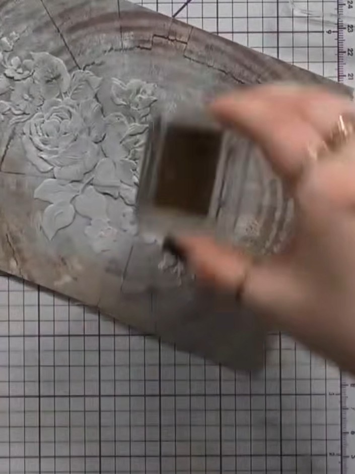 Step 7: Apply metallic ink in bronze or gold over the white embossed areas using a sponge applicator. Build up the col