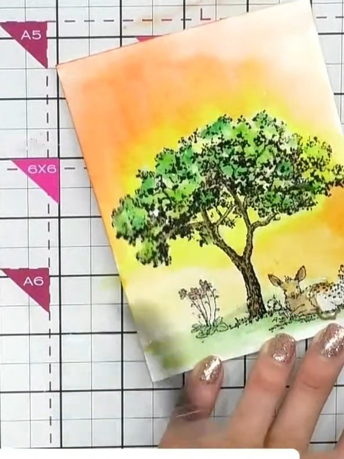 Step 11: Add a sentiment stamp such as 'Hope' or 'Positivity' using black ink to complete your card. Position the senti