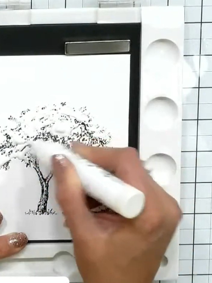 Step 4: Allow the masking fluid to dry completely for a couple of minutes until it appears shiny and clear. The tree a