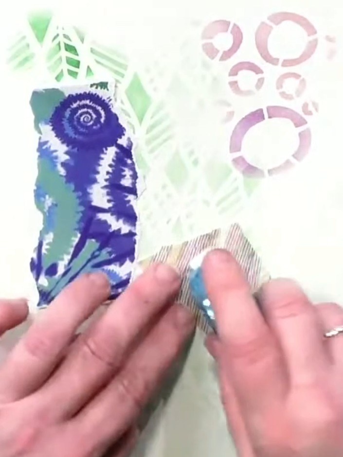 Step 4: Ink around the edges of torn paper pieces using an ink applicator to add definition and depth. Work the ink ge