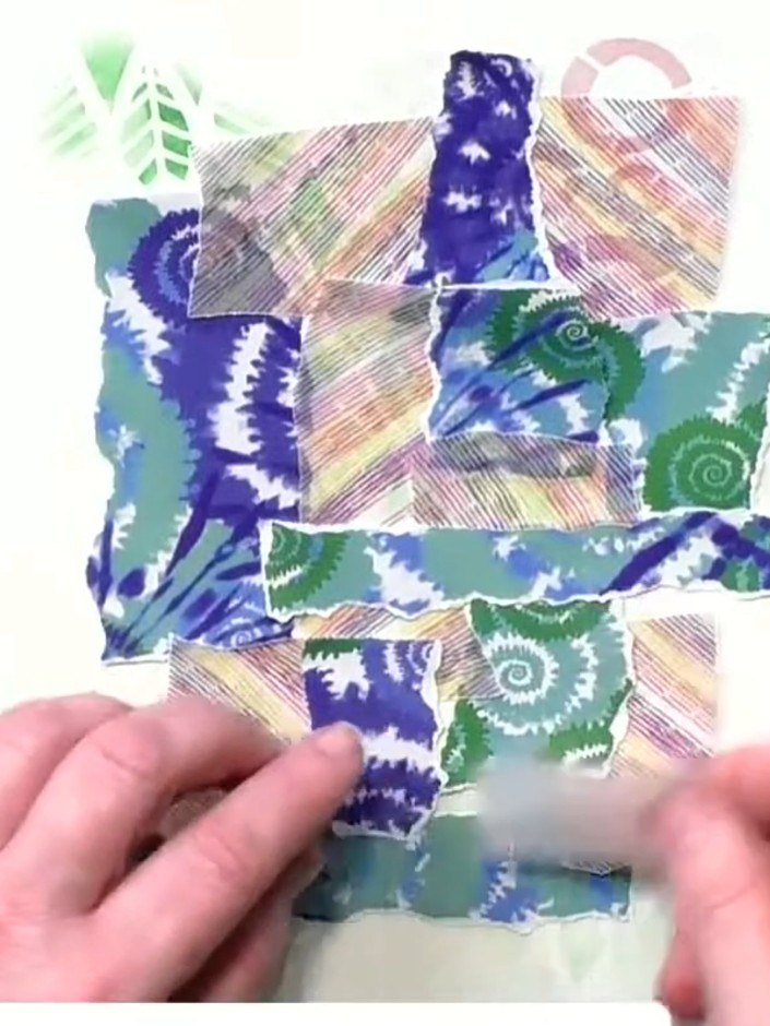Step 8: Continue layering and arranging the torn vellum pieces on your collage, overlapping them to build up texture a