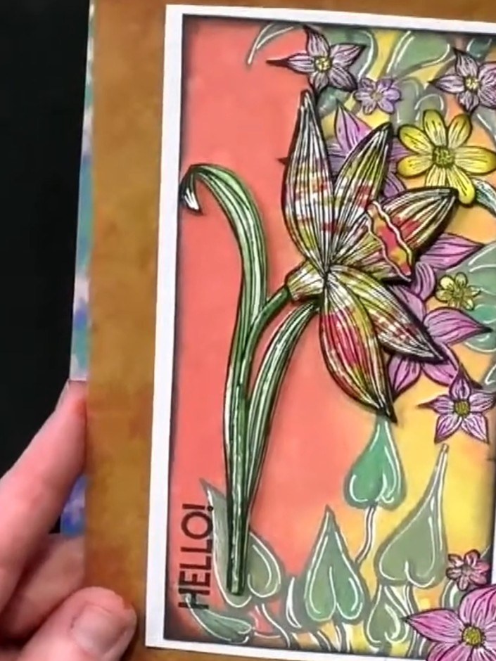 Step 1: Stamp the daffodil image onto white cardstock and colour it using your chosen medium. Mount the finished desig