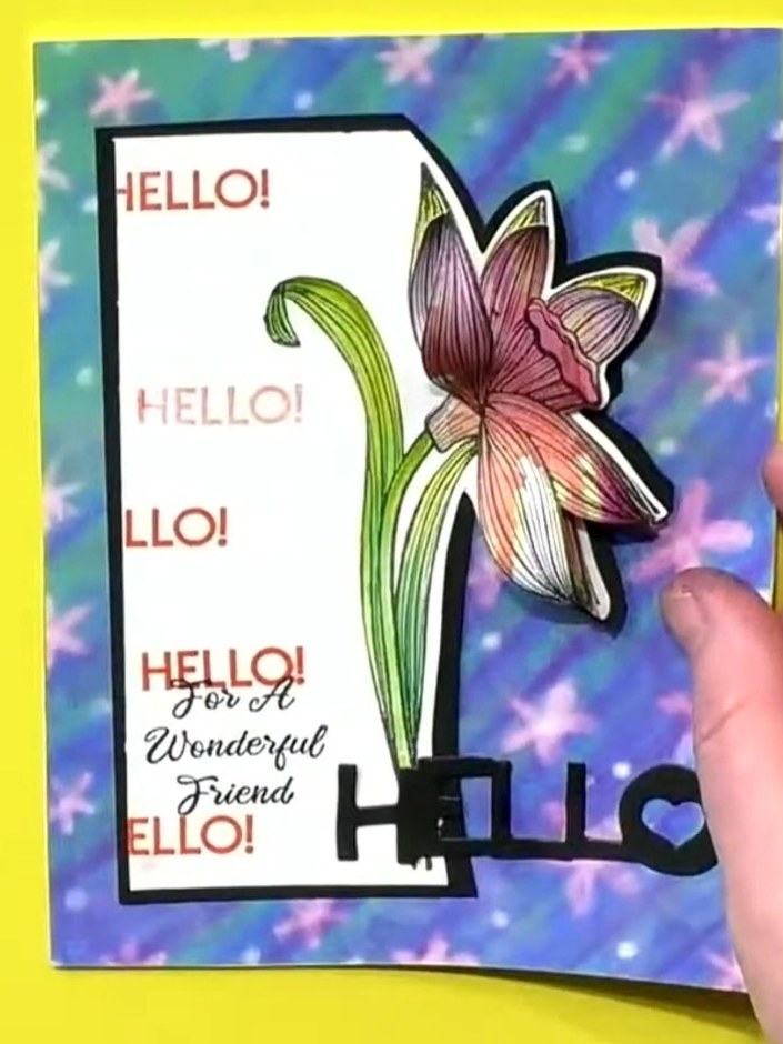 Step 3: Layer the coloured daffodil image onto a piece of blue textured cardstock to create a background for your desi
