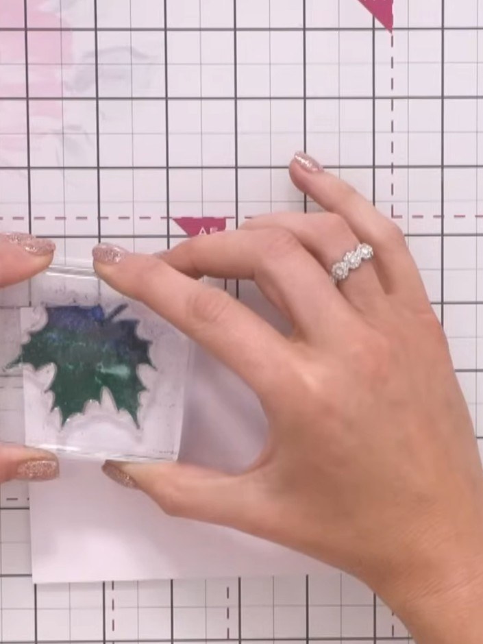 Step 1: Apply a base colour to your card using a soft shade of pigment ink from the Classic Collection. Spray lightly 