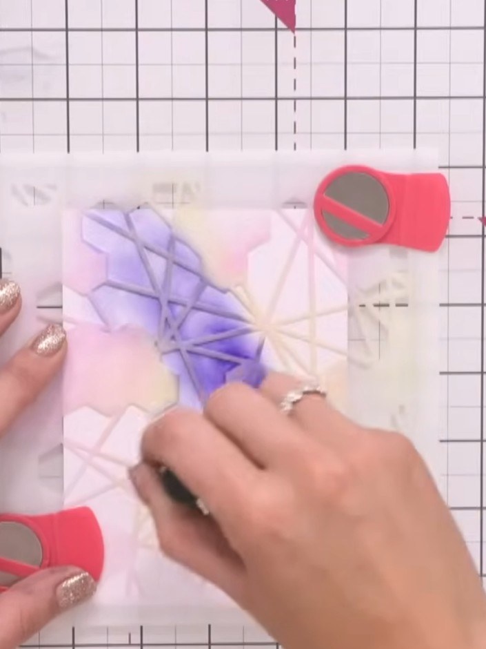 Step 1: Apply navy ink across your card stock using a blending tool, building up colour in the centre and fading towar