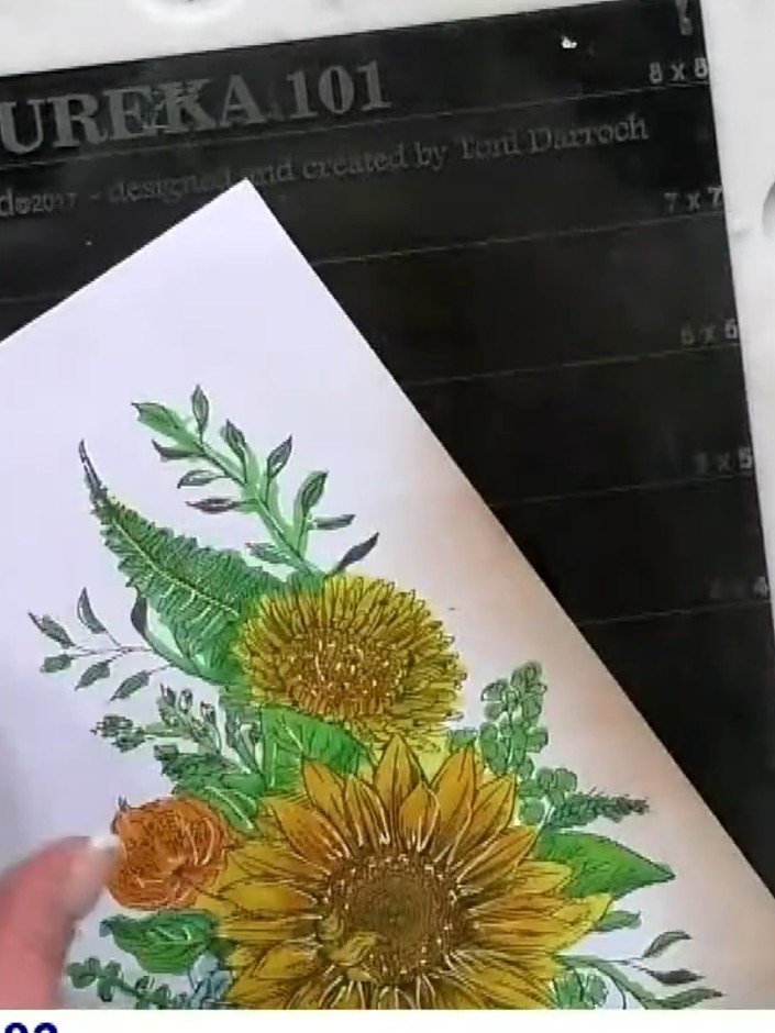 Step 4: Using scissors, carefully cut into every third or fourth petal of the stamped sunflower to create dimension. M