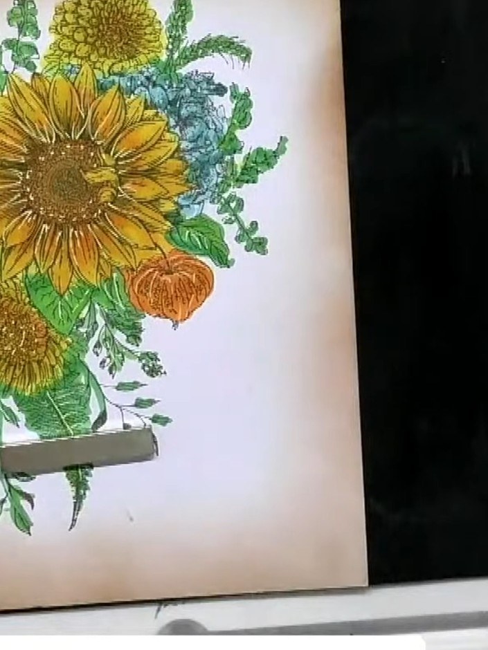 Step 5: Gently sculpt the sunflower petals using an embossing tool or your fingers to add dimension and create a more 