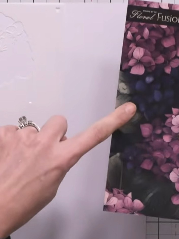 Step 1: Gather your materials: a Floral Fusion stencil and die set (such as hydrangea design), white card stock, and n