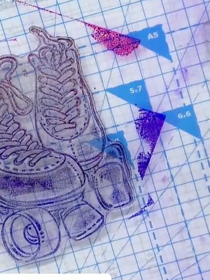Step 2: Stamp the roller skates image onto white cardstock, pressing firmly and evenly to transfer the ombré colours f