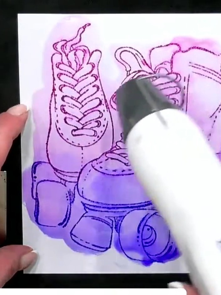 Step 5: Stamp the 'Roll with it' sentiment in black ink onto the card base. Position the stamp carefully before pressi