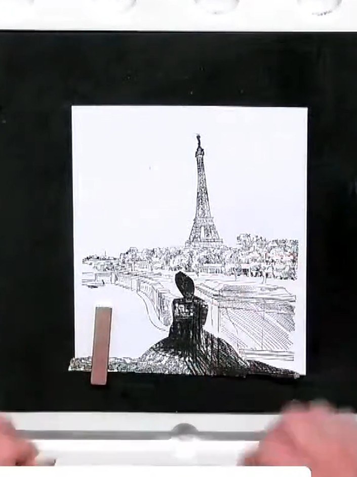 Step 3: Position the mask of the figure onto your white cardstock where you want the silhouette to appear in your Pari