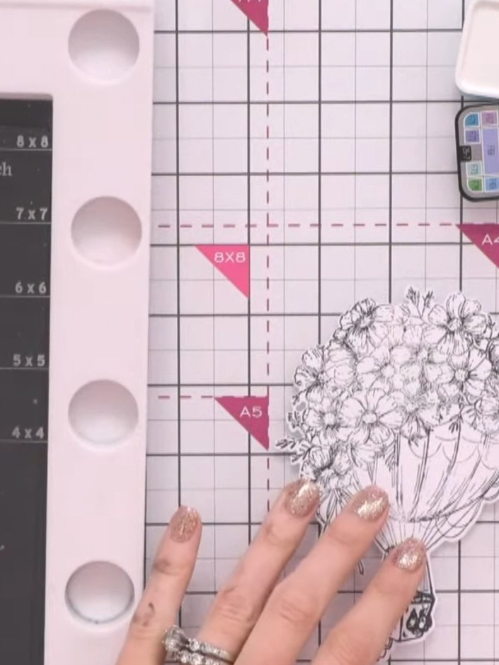 Step 10: Colour the balloon petals lightly with watercolour, leaving white space and using soft pastel colours rather t