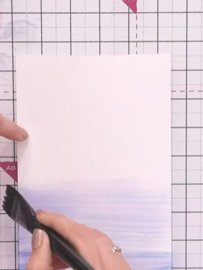 Step 2: Apply your first ink colour to the white card using a flat brush. Use Surfboard or Sherbet ink and angle the b