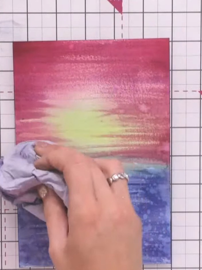 Step 8: Allow the watercoloured background to dry completely. Once dry, trim it to A4 size and mount it onto black car
