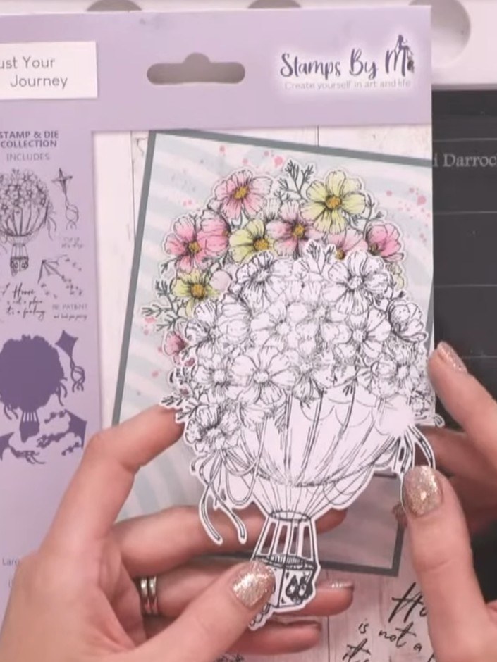 Step 9: Stamp the hot air balloon image from the Trust Your Journey stamp set onto white card using black ink. Positio