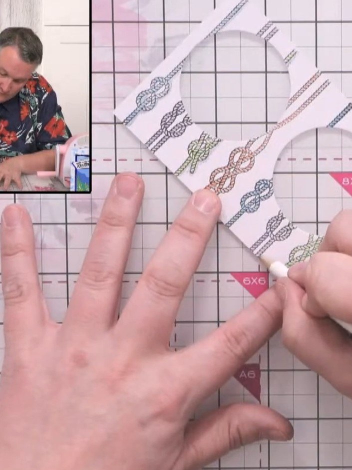 Step 6: Use a grey pencil to add shading underneath each coloured rope section. This creates a shadow effect that lift