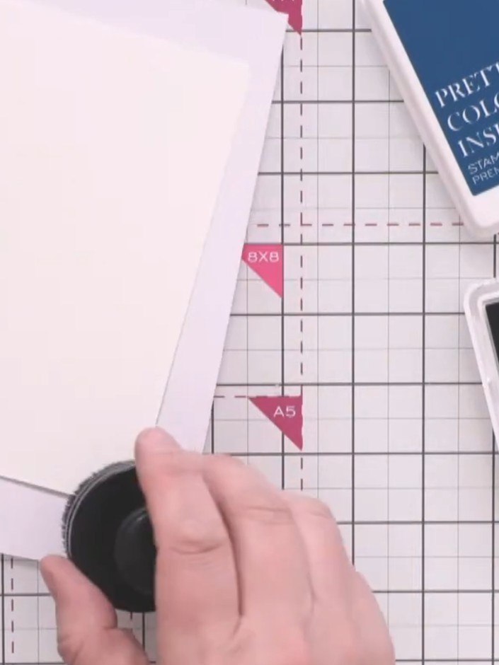 Step 3: Pick up the Ocean ink pad with a circular blending brush and start blending from your chosen corner in light c