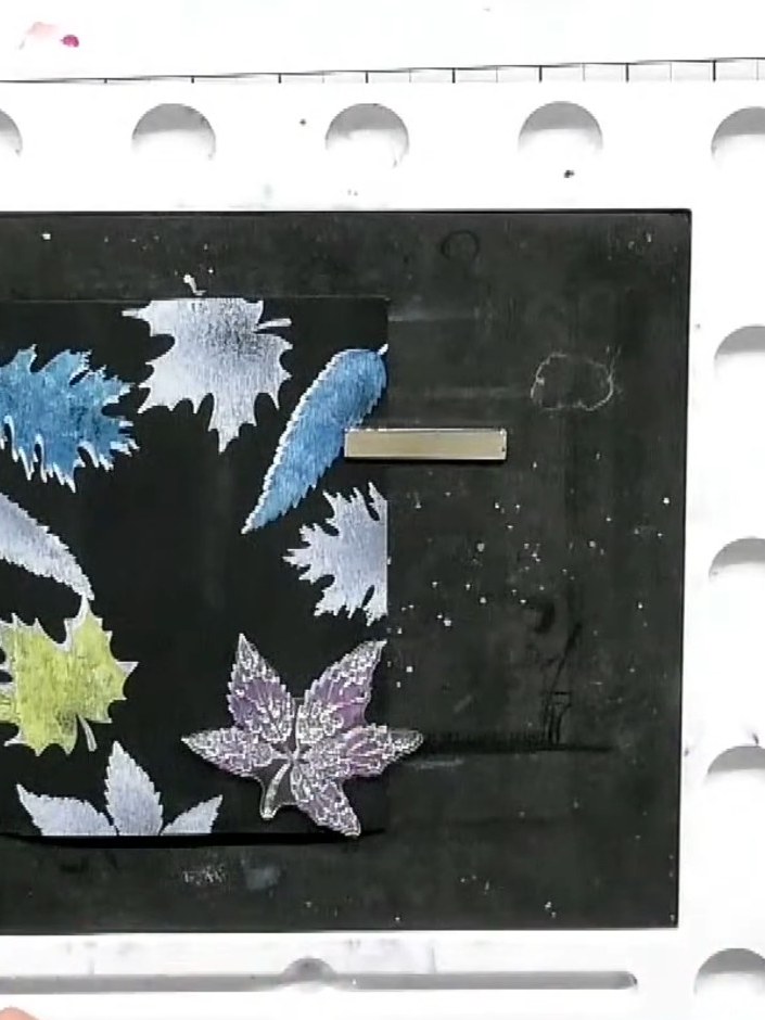 Step 3: Stamp the detail overlay portion of each leaf stamp in black ink over the coloured impressions to add definiti