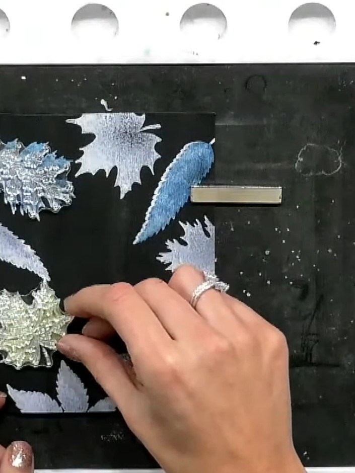 Step 4: Add embossing powder to the stamped leaf images if desired. Heat set with a heat tool to create extra dimensio