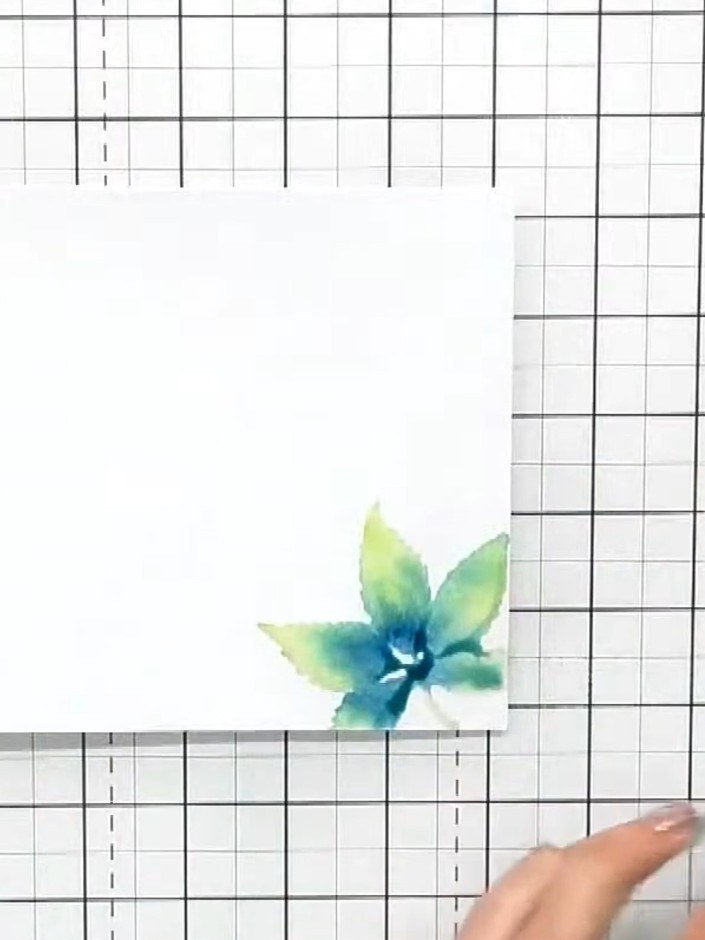 Step 2: Apply limeade and ocean ink colours to the stamped leaf image using an ink applicator. Press down firmly to bl