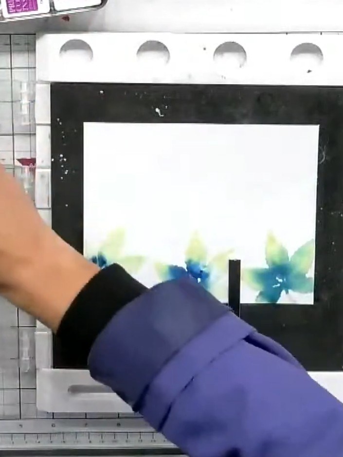Step 7: Apply embossing powder to the stamped areas and heat set with a heat tool to create a raised, glossy finish fo