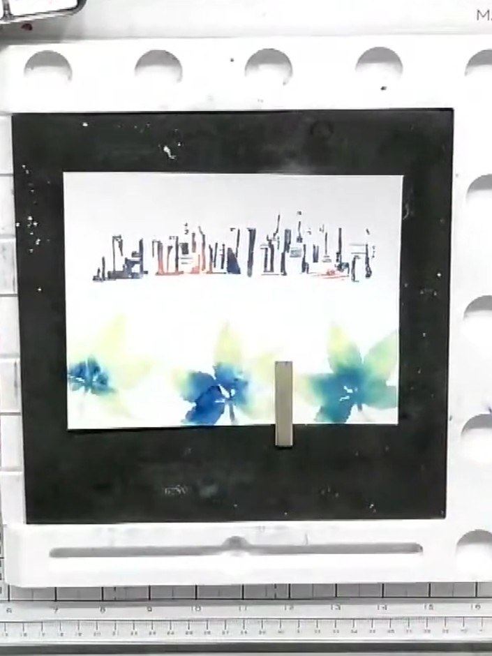 Step 9: Use a pencil to draw connecting lines between the design elements to create perspective and link the cityscape