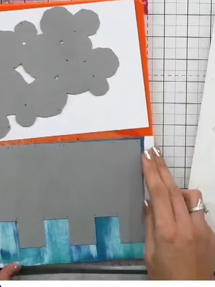 Step 4: Apply a darker shade of grey ink around the exterior edges of the cut panels using a blending tool to enhance 