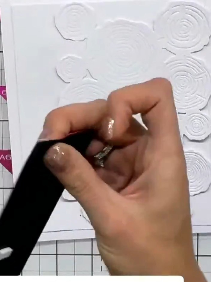 Step 6: Insert a piece of scrap card into the punch slot and press down firmly on your work surface to create a punche