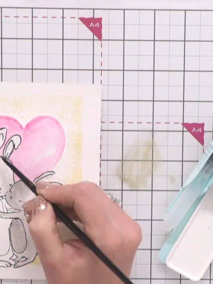 Step 10: Using a fine brush with brown or mustard watercolour, add a thin line around the outer edge of the yellow fram
