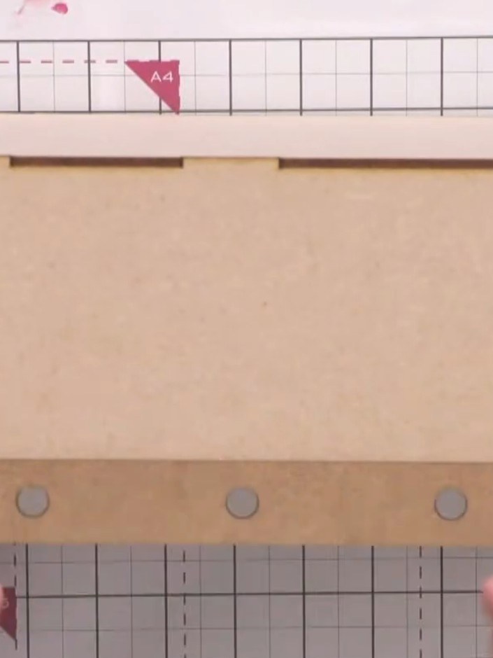 Step 2: Apply adhesive to the seams of the MDF base piece where the sides will connect. Position the base piece with t