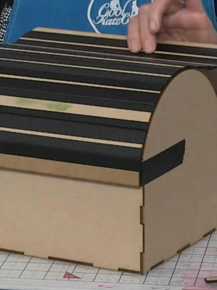 Step 7: Place your finished ATCs inside the wooden box. Close the lid, allowing the magnets to secure it shut.