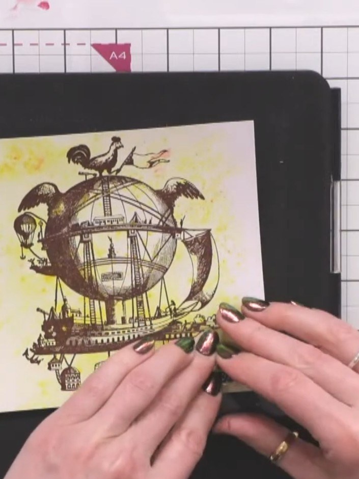 Step 7: Mount the stamped and coloured image onto black metallic card to create a border and add dimension to your fin